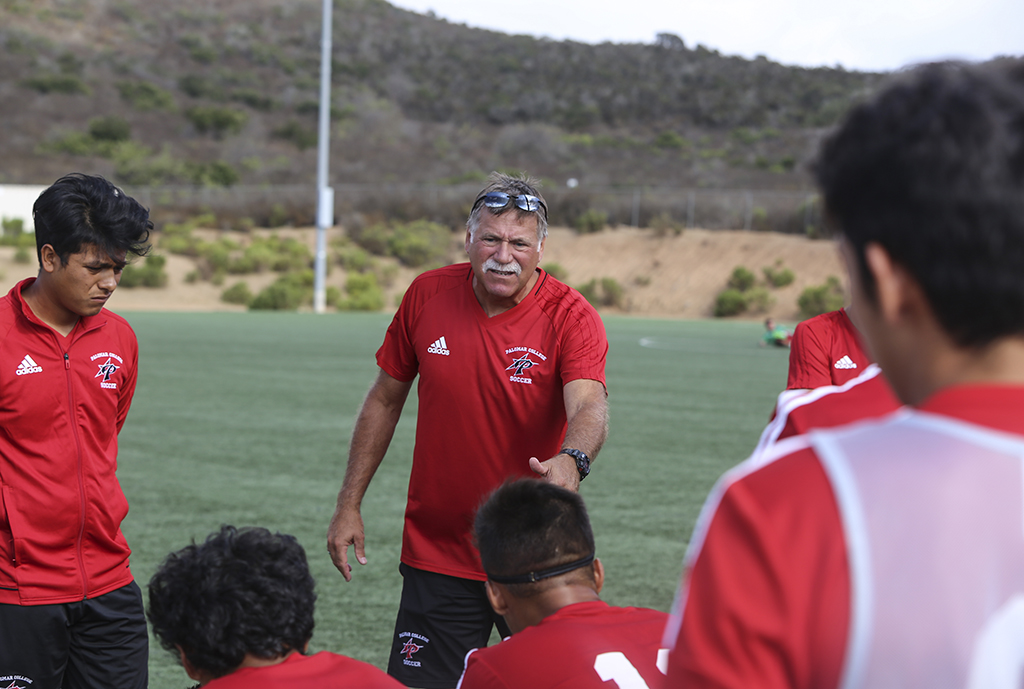 David Linenberger instructs Palomar men's soccer team on their next strategy before the second match start, Sept. 15, 2017, at Minkoff Field. (Larie Tobias Chairul/The Telescope)
