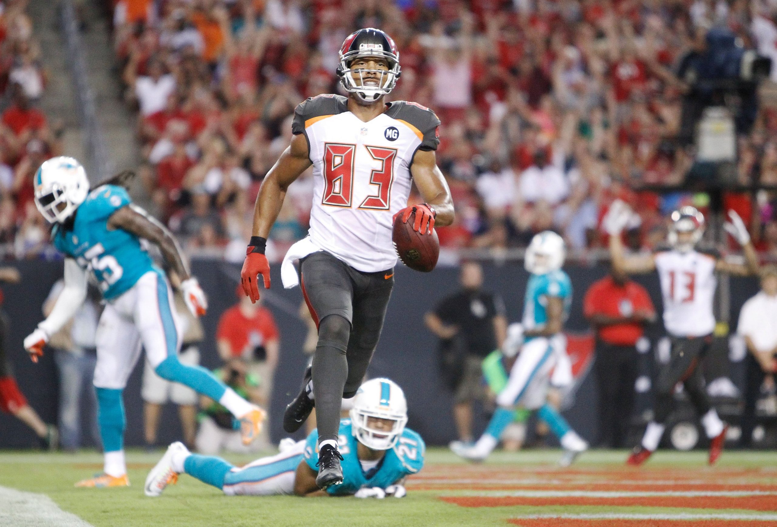 Tampa Bay Buccaneers wide receiver Vincent Jackson (83) scores a 7-yard touchdown on a pass from Josh McCown against the Miami Dolphins at Raymond James Stadium in Tampa, Fla., on Saturday, August 16, 2014. (Brendan Fitterer/Tampa Bay Times/TNS)