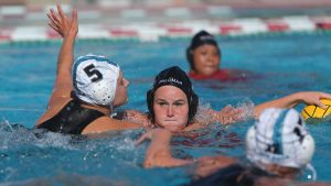 Sydni Dickson playing in a water polo game for Palomar College before the COVID-19 pandemic. (Picture provided by Sydni Dickson)