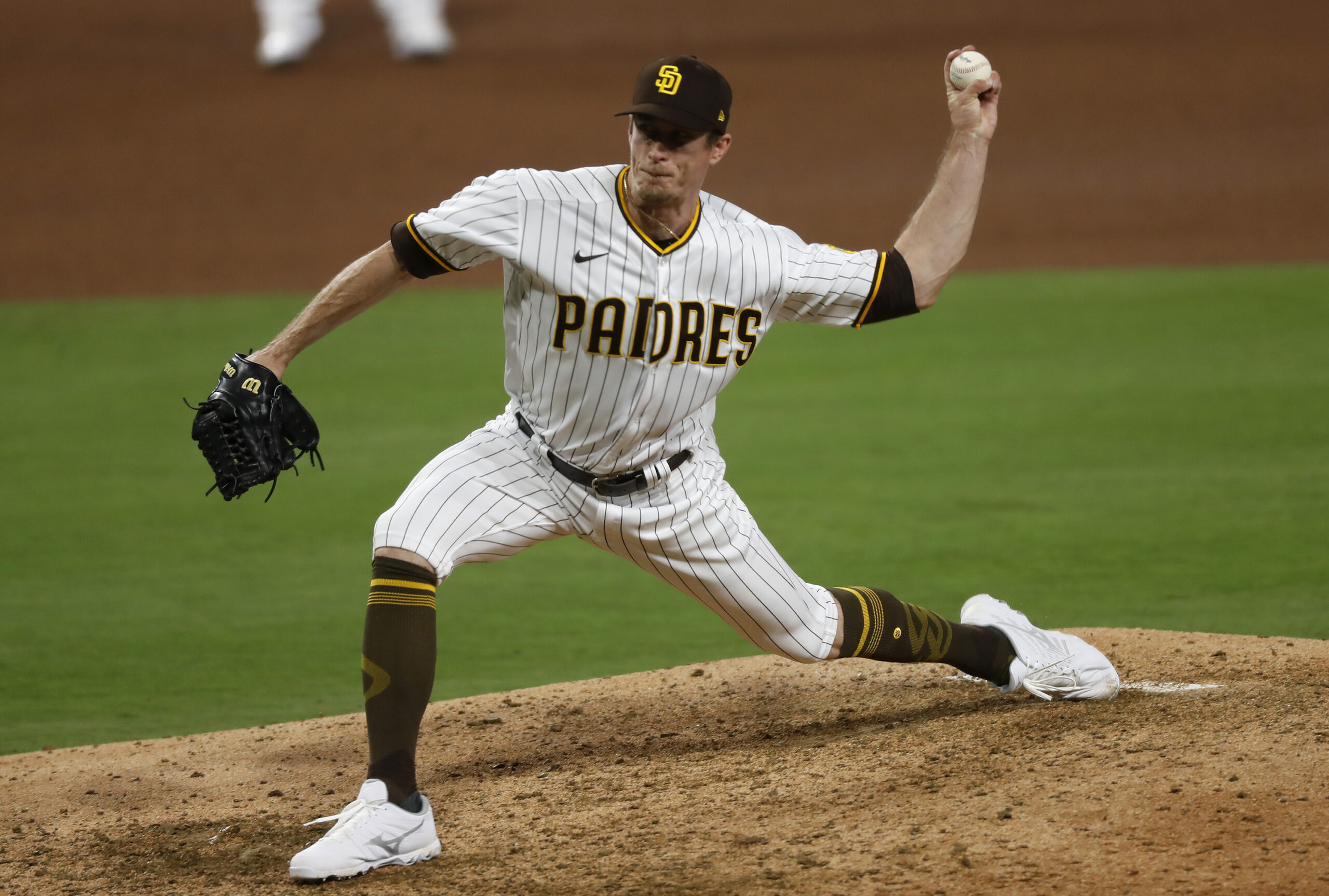 San Diego Padres pitcher Tim Hill throws in the seventh inning against the Los Angeles Dodgers at Petco Park in San Diego on Tuesday, Aug. 4, 2020.