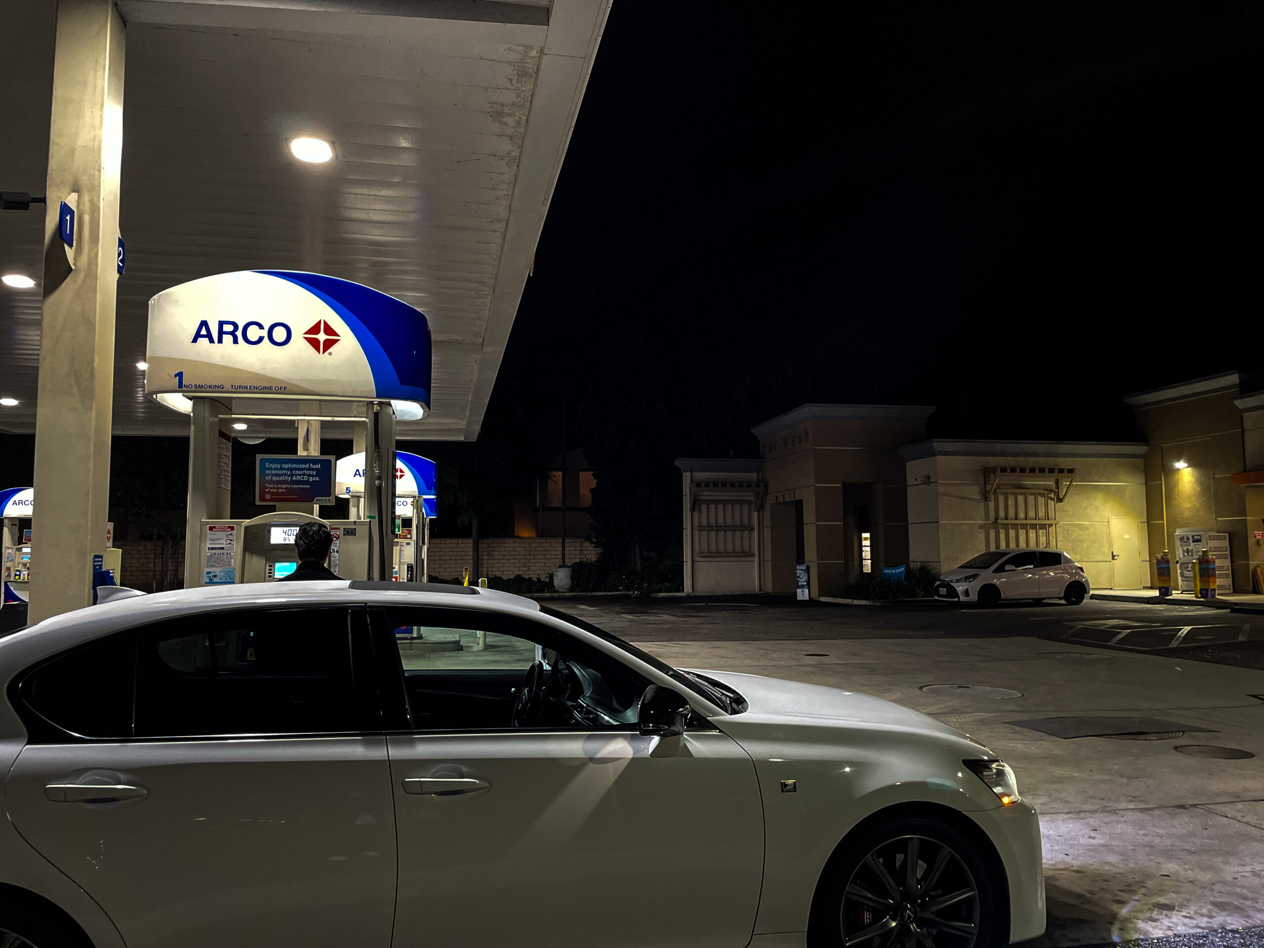 Car next to gas pump