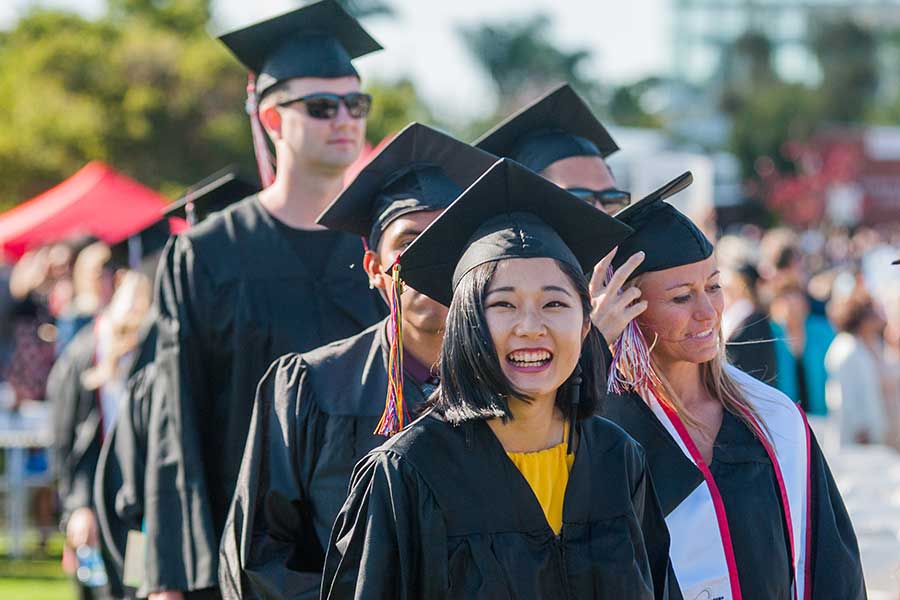 Smiling graduates.