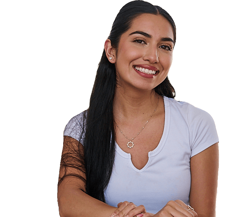 Smiling Palomar College graduate holding a diploma cover.