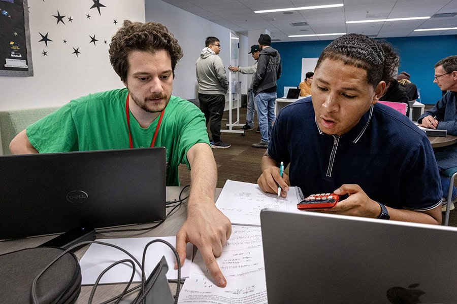 Two students working together.