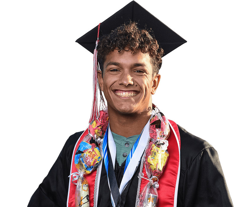 Smiling Palomar College graduate looking at the camera.